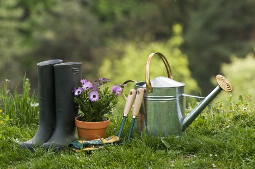 Inspector reviewing garden work with clipboard